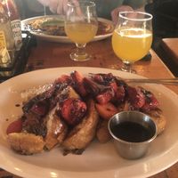 Incredible vegan lemon infused berry french toast with mimosas!  at Fig Tree Cafe - Pacific Beach in San Diego