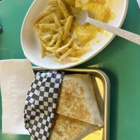 Loco Tostaritto and cheesy fries! Mmmm  at Vegos in Albuquerque