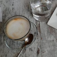 Oatmilk Coffe at TINKA BAR & BISTROT in Nago-torbole