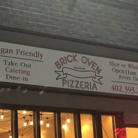 Sign outside  at Brick Oven Pizzeria in Omaha