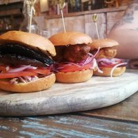 Burger sliders, all good but Fritter was incredible 10/10 would recommend at Bus Stop in Stockton Heath