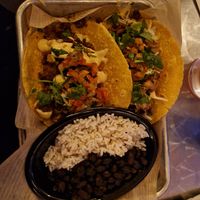Tacos with impossible meat, beans and rice as a side at Treehouse Taqueria in Ogunquit