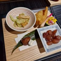 Appetisers including sesame gluten with melon, rice in tofu pocket and sweet red beans at Hanafubuki in Ito