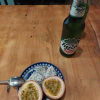 Complimentary fruit and cold local beer at Madam Thu in Hue