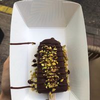 Mini chocolate - hazelnut Ice Pop dipped in dark chocolate and topped with pistachios (completely sugar free btw.) at Anjuna Ice Pops - Pozsonyi Ut in Budapest