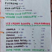 Vegan items in green at Raj's KofiBar in Auroville