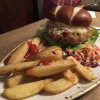 Yukatan spicy bean & sunflower seed burger, chips & coleslaw   at Bar T'at  in Ilkley