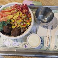 Salad bowl (half & half, falafel,  roasted corn salsa, pickled red onion, tomato slices, cheezy blend, creamy cashew sauce) at TREEHOUSE - H Code in Hong Kong Island