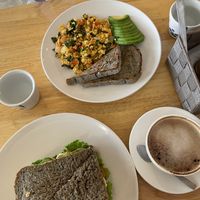 Scrambled tofu, soy cappuccino and humus avo sandwich  at CV Cafe in Kampot