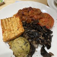 Excellent vegan breakfast, all homemade, including bubble & squeak, smoked tofu, spiced beans and lots of mushrooms.   at Cairn Lodge Services in Lanark