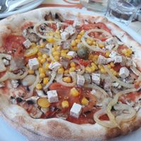 Vegetarian pizza without cheese and added tofu. at Maslina in Rijeka