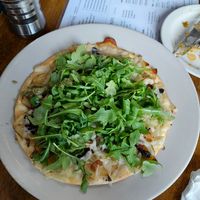 Yummy 🥔 🍕  with pesto and rocket at Peacefood Cafe - Uptown in New York City