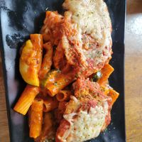 Parmesan rigatoni and pfc cutlet at Peacefood Cafe - Uptown in New York City