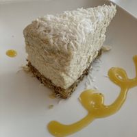 raw cashew cream cheesecake: cashew, lemon juice, coconut oil & agave in an almond cashew crust  at Peacefood Cafe - Uptown in New York City
