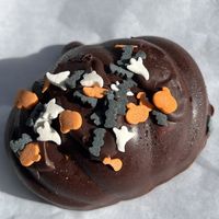 Holiday mini cake covered in chocolate   at Peacefood Cafe - Uptown in New York City