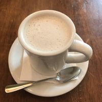Oat milk coffee  at Peacefood Cafe - Uptown in New York City
