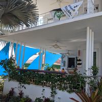 Patio seating in the shade at Passiflora in Rincon