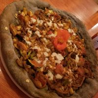 Pizza with unique hemp base at Nico-Simply in Nakano