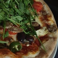 Vegan pizza with vegan cheese. at Peloton in Oslo