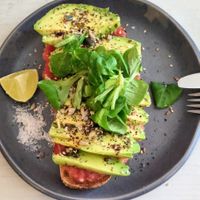 Toast Avocado Tomato Seeds Summach at Cinnamon in Bilbao