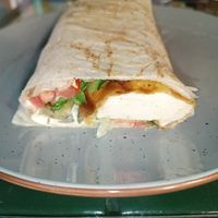 Just half!! Of their delicious tofu zinger sandwich, which I shared with my 4 year old. The burger also looked delicious and my husband had the shawarma which he also enjoyed! at Bayt Sara in Amman