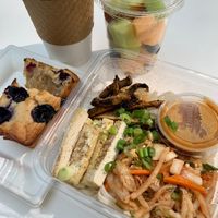 Happy vegan meal at the museum cafe! Asian noodle salad, vegan loaf, almond milk cappuccino and a fruit cup.  at Provenance Cafe in Cleveland