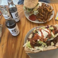 ‘Gyros’ pita with tzatziki & hot sauce and the cheese burger menu  at Vleischerei in Leipzig