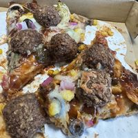 Created my own with mushrooms, artichokes, olives, onion, corn, BBQ Sauce, vegan meatballs, vegan cheese   at Angelina's in Seaside