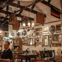 interior with Noel depicted standing at Bloodroot in Bridgeport