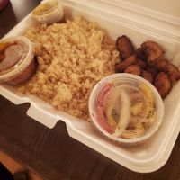 Attieke: Seasoned ground cassava with sautéed vegetables, fried sweet plantains & homemade attieke sauce at Kings and Queens in Upper Darby