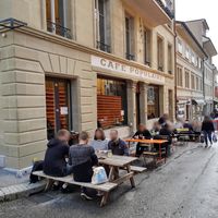 Outdoor seating at Cafe Populaire in Fribourg