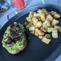 Avocado toast + mushrooms with new potatoes (vegan) at Marmalade in Merida
