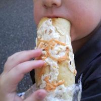 Cheezy breadstick so good, my son wouldn't stop eating it to take the picture. at Karmavore in New Westminster