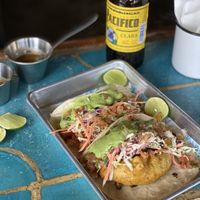 1 deep fried avo taco and 1 sweet potato taco, both vegan tacos came with non vegan cole slaw  at Barracuda Cantina in Cerritos Beach