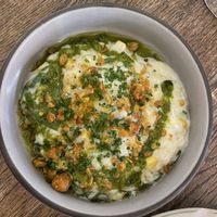 Risotto-style spinach and corn in coconut cream, puffed corn and pumpkin seed crisp  at Paisano in Helsinki