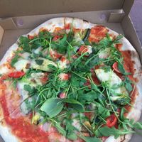 Zucchini Pizza with vegan cheese, fresh cherry tomatoes, rocket and basil  at Da Francesco in Nice