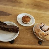 Cinnamon whirl, biscoff biscuit and dark chocolate and something yummy and fruit type cake🤣 at Huckleberries in Cromer