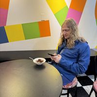 Louis eating vegan chocolate peanut butter swirl   at Izzy's Frozen Yogurt & Ice Cream in Portsmouth