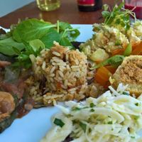 All main 3 dishes of the day on one plate. Rice, tofu with soy cream, salad, beans and soy roll with tender dough stuffed with tofu. at M Butterfly by Miss Saigon in Lisbon