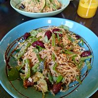Dinkelspaghetti mit Zucchini, Buschbohnen, Tofu, Olivenpesto, Kalamataoliven und Cashewparmesan at Café GUTTUT in Dortmund