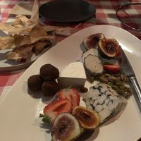 Cheese platter with ‘chevre’ ‘Camembert’ and ‘blue’. Chocolate truffles 🤤 at Caruso's in Gymea