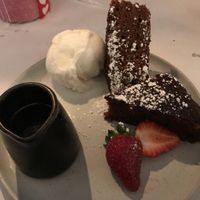 Vegan sticky date, one serve is enough for two 👌 at Caruso's in Gymea