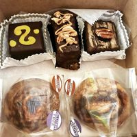 Sacher torte, peanut bar, german chocolate brownie, cinnamon rolls at Rheinlander Bakery in Arvada