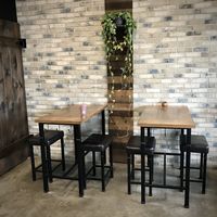 A few tables inside, a counter and outside seating in summer at Simply Pressed Juice in Granger