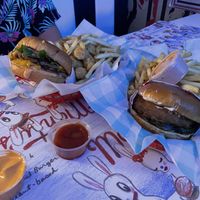 Double burger with 50/50 tots and fries (left) chicken sandwich with fries   at Monty's Good Burger - Echo Park in Los Angeles