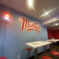 Interior - cute, some seating has seen better days   at Monty's Good Burger - Echo Park in Los Angeles