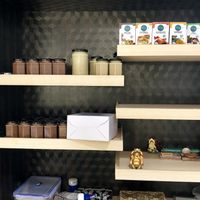 Jars of in-house vegan “Nutella” and peanut butter. at Elysian Delights - Ethigreenz in Gurugram