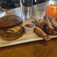 Chickpea parmesan sandwich with sweet potato fries  at ION - It's Only Natural Restaurant in Middletown