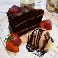 Chocolate cake and ice cream at Puti Vegan Cafe in Glasgow