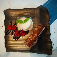 Chocolate biscuit cheesecake and ice cream at Puti Vegan Cafe in Glasgow